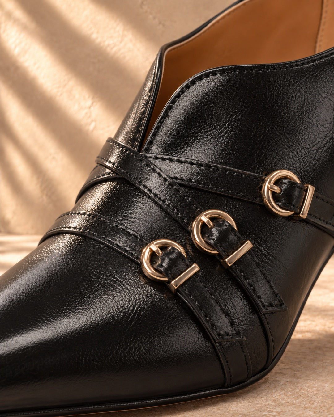 Evelina Triple-Buckle Spool-Heel Pumps in Charcoal - material detail
