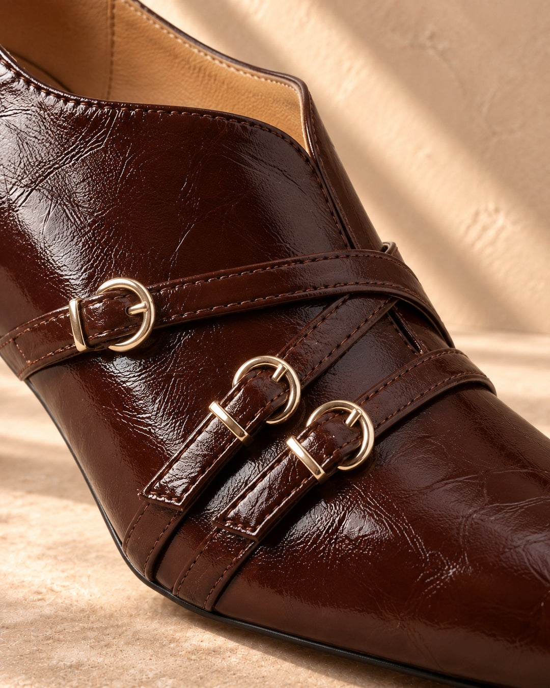 Evelina Triple-Buckle Spool-Heel Pumps in Mahogany - material detail