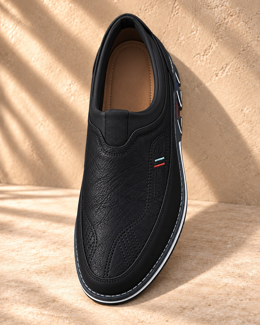 Lorenzo Faux-Leather Hybrid Loafers in Matte Black - top view